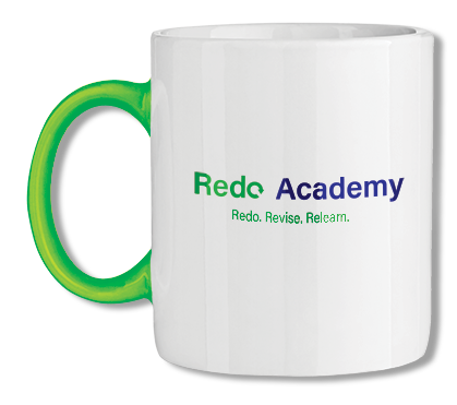 This image shows a white mug with a green handle, and Redo Academy's 
		logo.